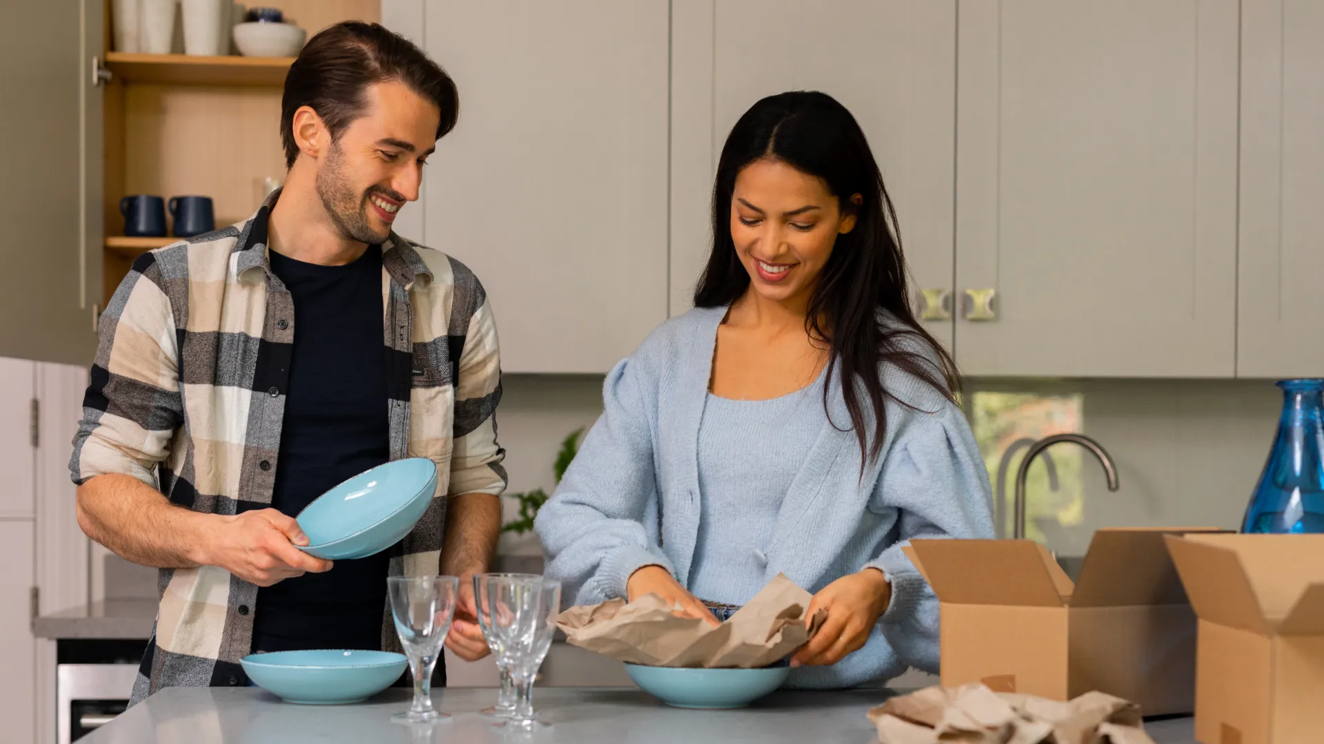 couple packing blue plates