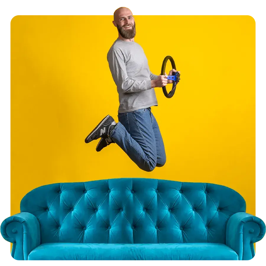 Removals expert jumping on a large sofa