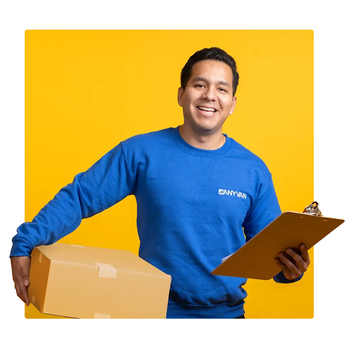Delivery man offering good customer service with box and clipboard
