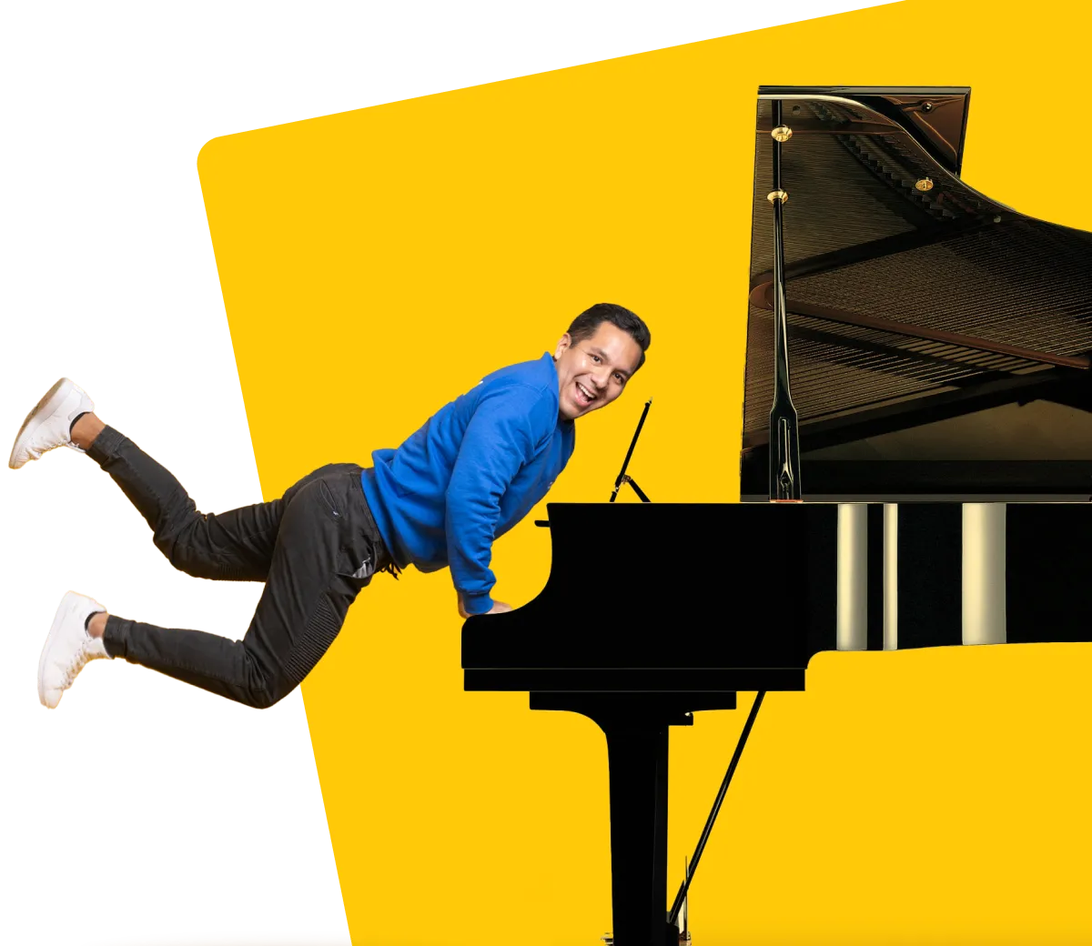 AnyVan employee playing a piano with his legs in the air - piano transport